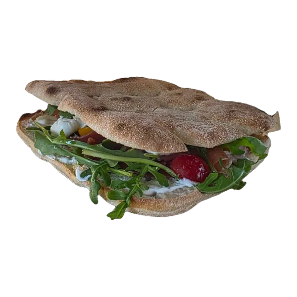 Sandwich garni de roquette, tomates et mozzarella